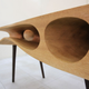 Image for article titled This Sleek Table Is Hiding a Playground For Cats